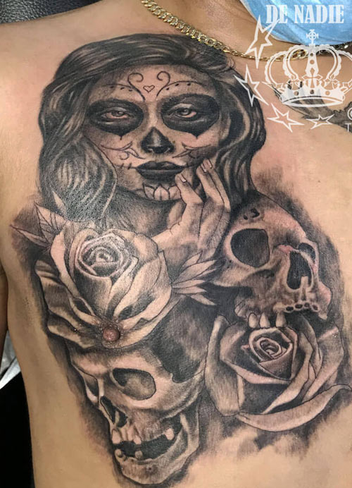 Day of the dead tattoo done by Infierno Pain ink