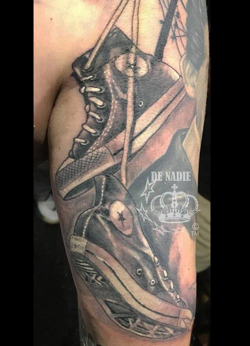 Chuck taylor tattoo done by Infierno 