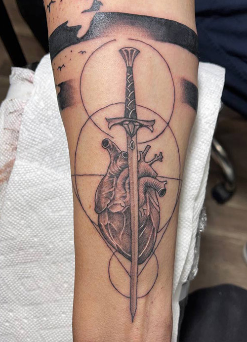 Heart tattoo done by Rene ramos Queens NY
