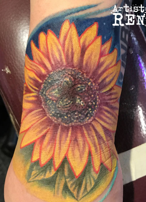 Sunflower tattoo done by Rene
