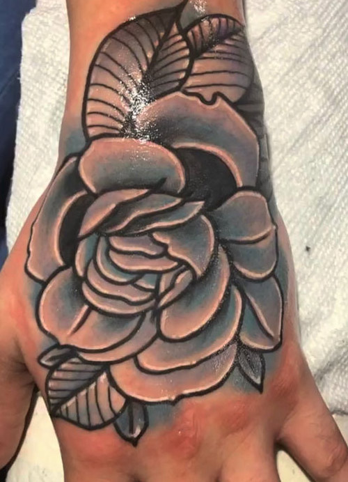 Rose tattoo done by Rene Queens NY
