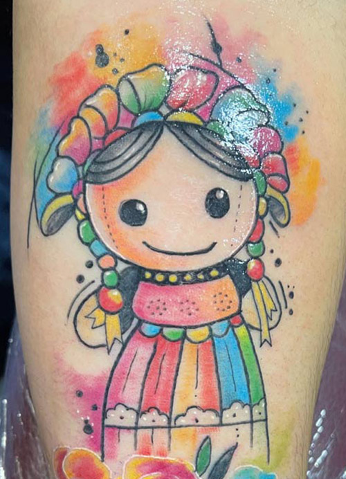 Doll tattoo done by Rene Queens NY