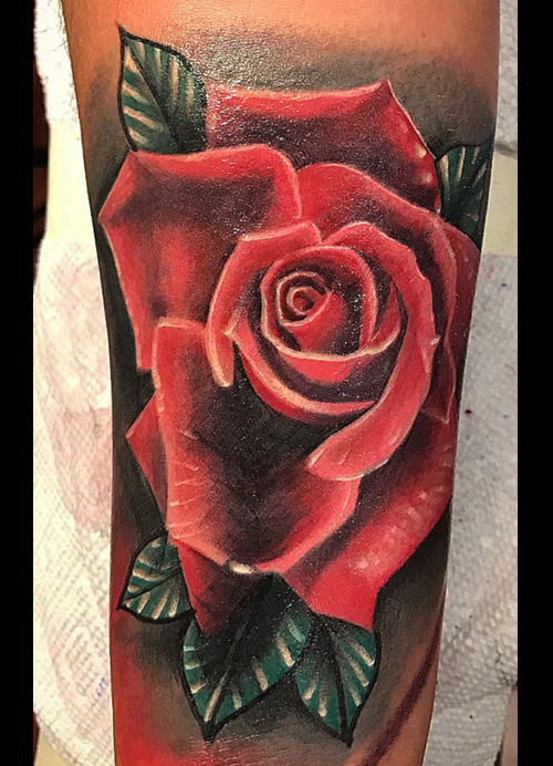 Rose tattoo done by Rana ramos 