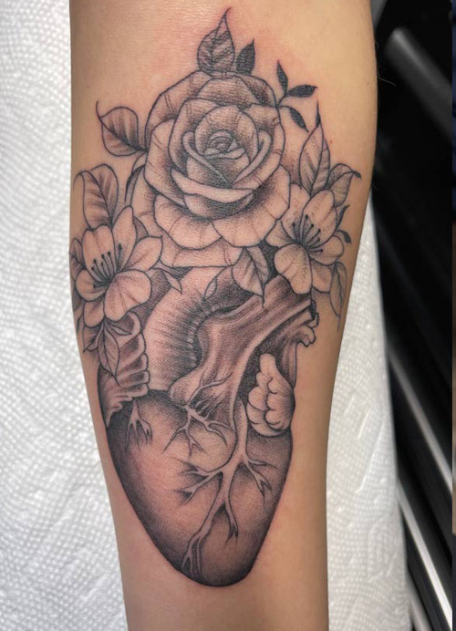 Heart tattoo done by Rana ramos